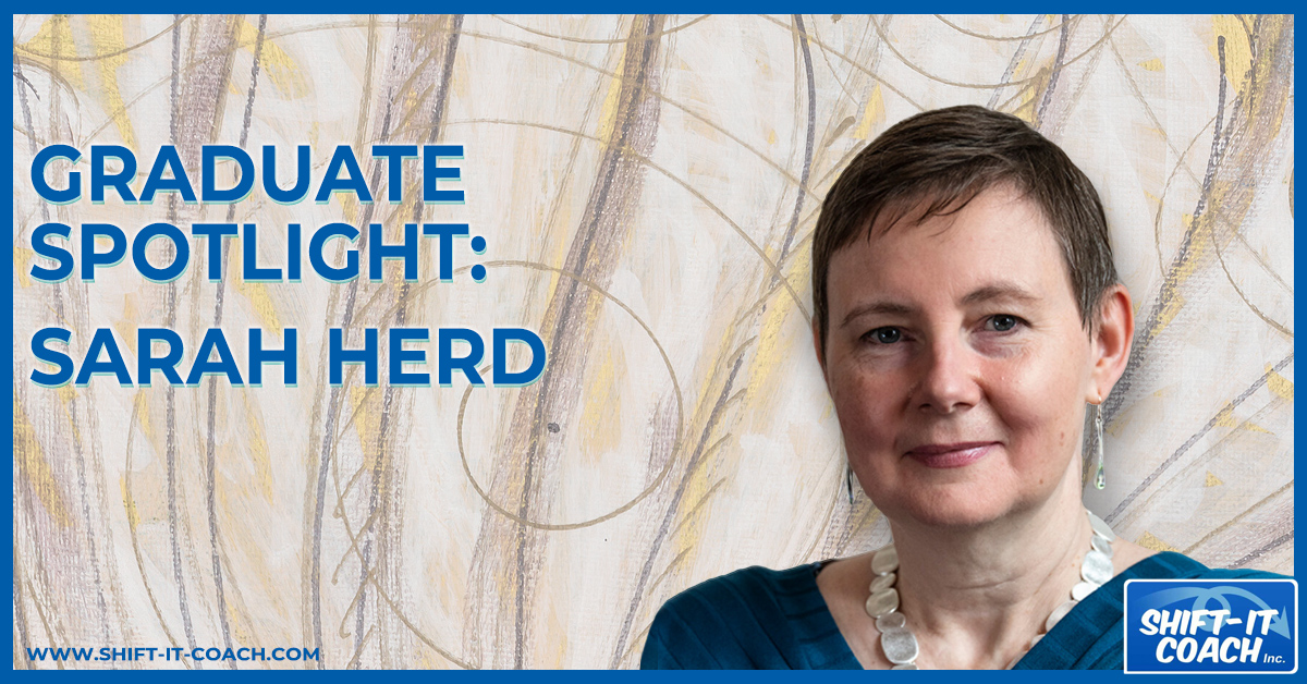 Certified Visual Coach graduate spotlight on Sarah Herd from the UK. Sarah smiles at the camera in a blue sweater against an oyster colored background of original art.
